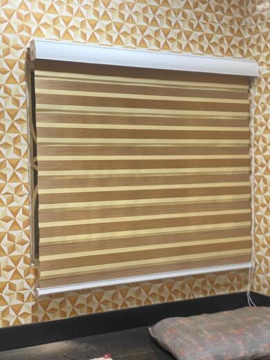 A zebra blind fitted by KD Dream Space Designs