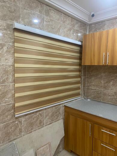 A zebra blind fitted by KD Dream Space Designs