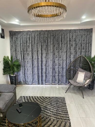 A pair of straight curtains made and hung by KD Dream Space Designs