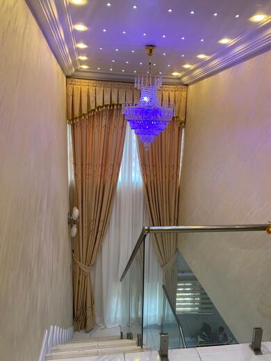 A pair of straight curtains made and hung by KD Dream Space Designs