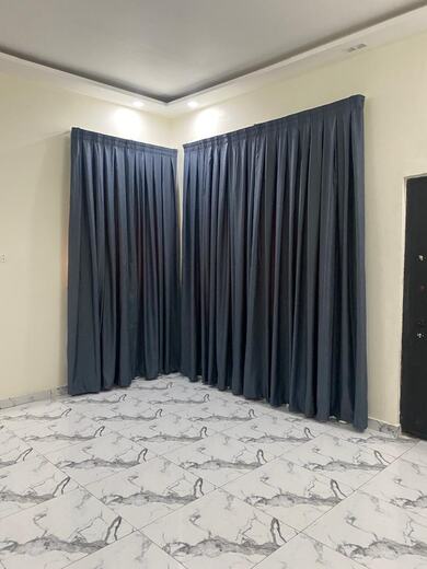 A pair of straight curtains made and hung by KD Dream Space Designs