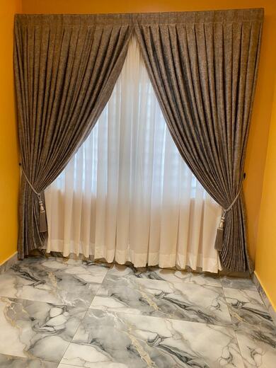 Curtains hung over a voile by KD Dream Space Designs